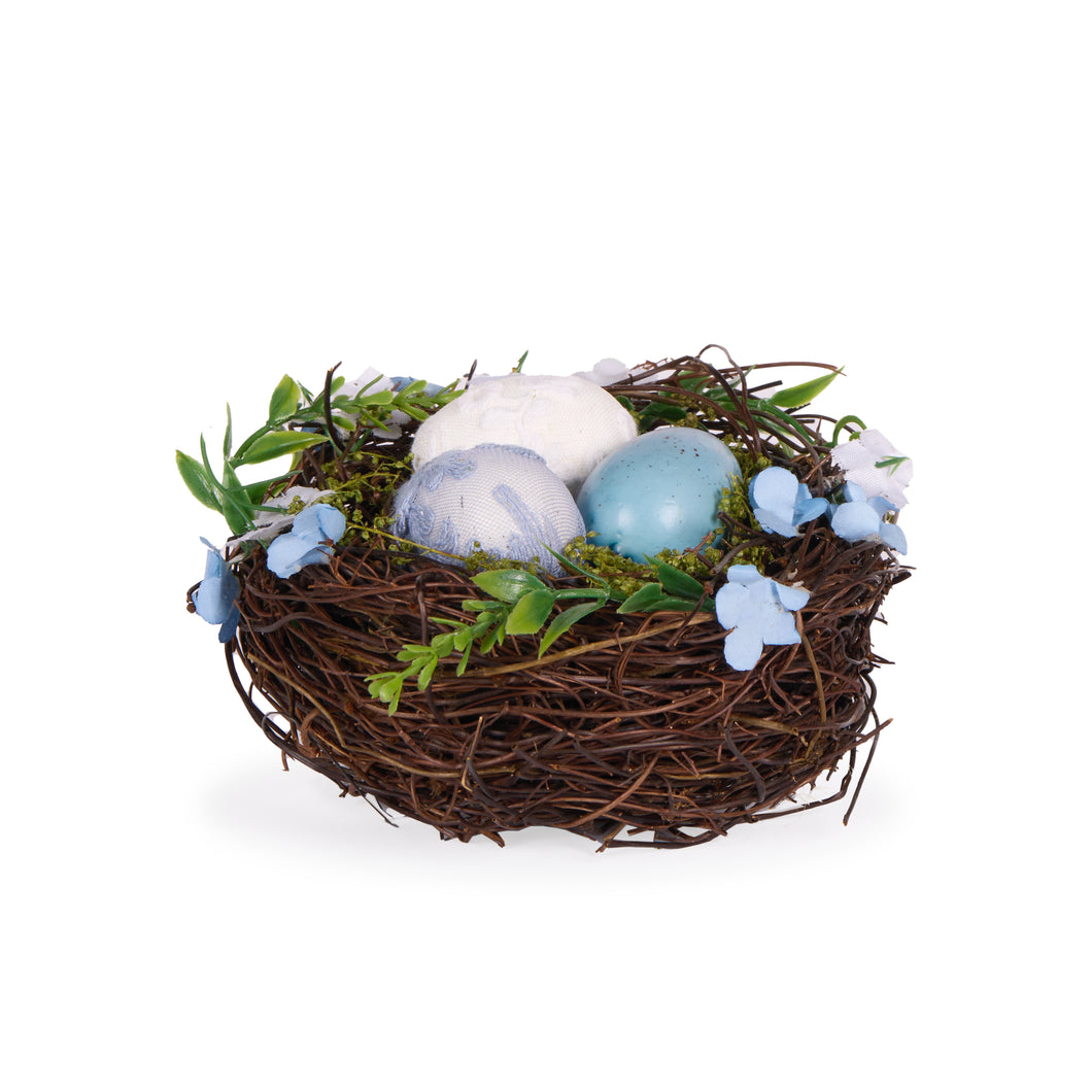 Small Nest With Blue And White Eggs